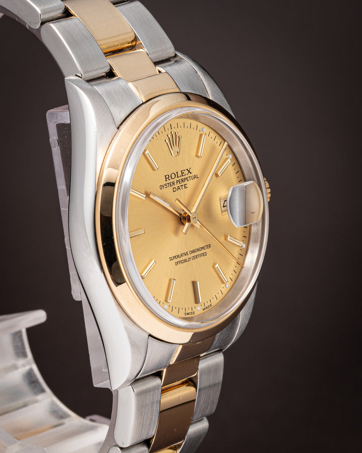 Rolex Stainless Steel and 18k Yellow Gold Date (15203)