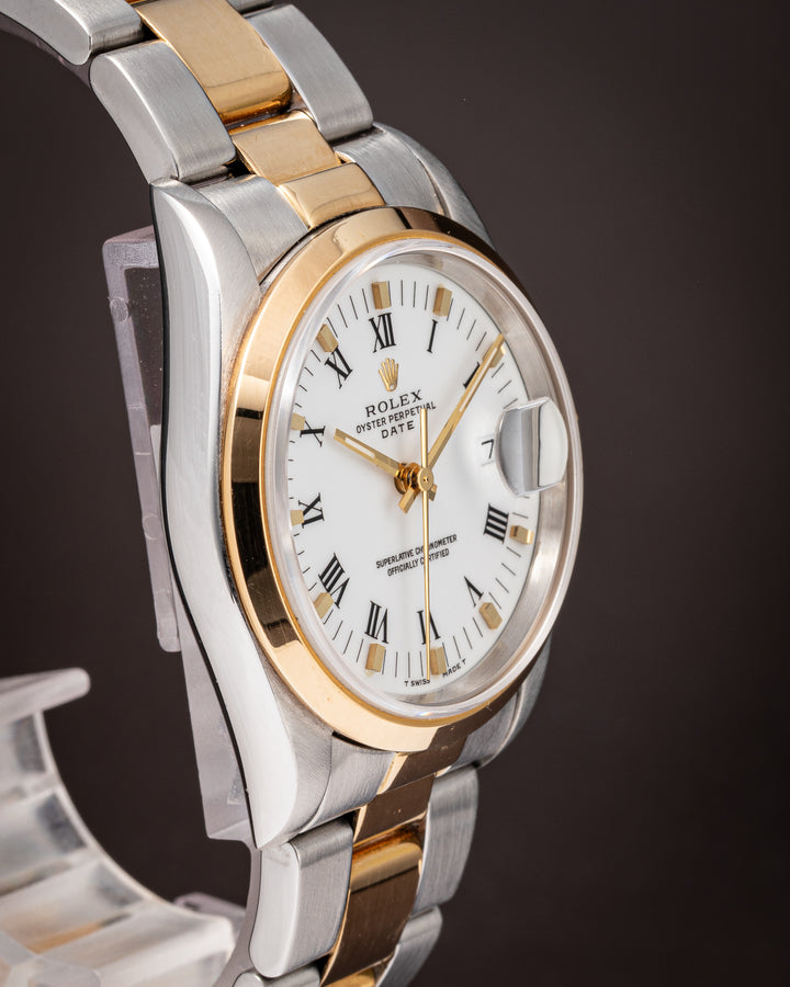 Rolex Stainless Steel and 18k Yellow Gold Date (15203)
