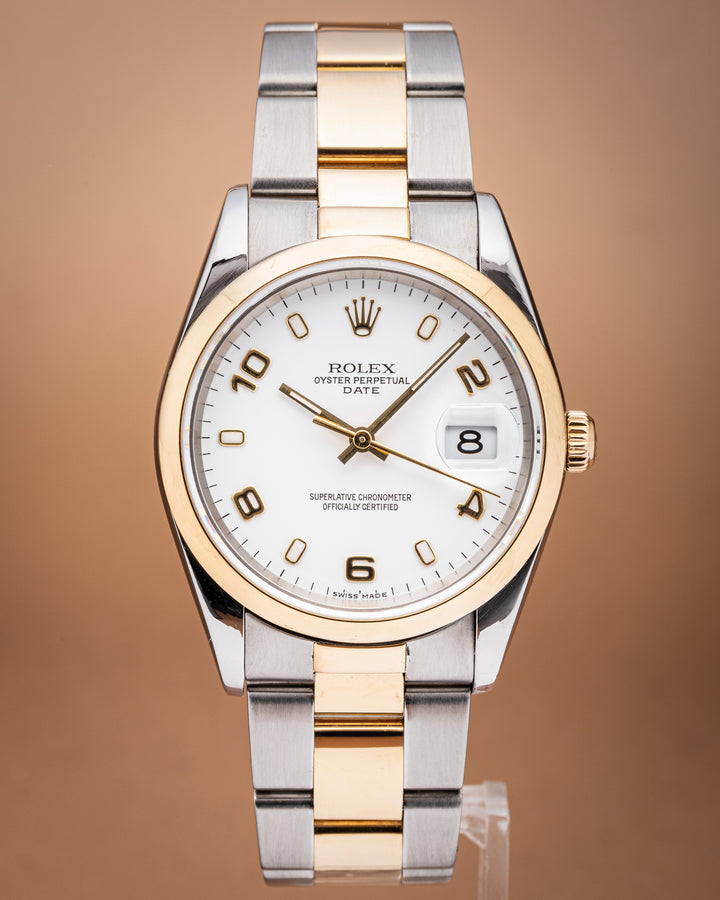 Rolex Stainless Steel and 18k Yellow Gold Date (15203)