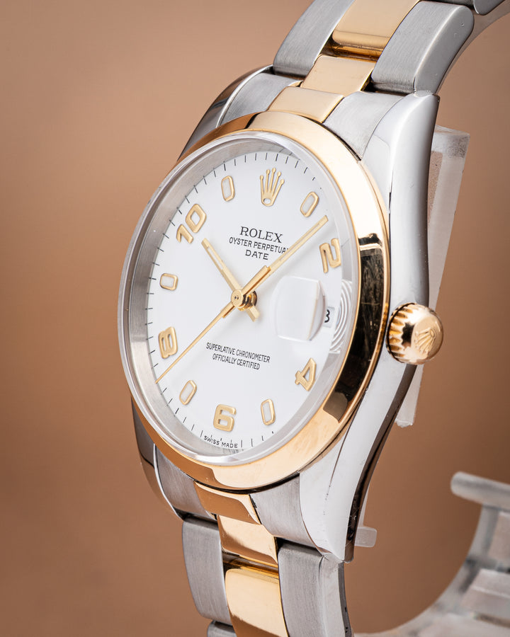 Rolex Stainless Steel and 18k Yellow Gold Date (15203)