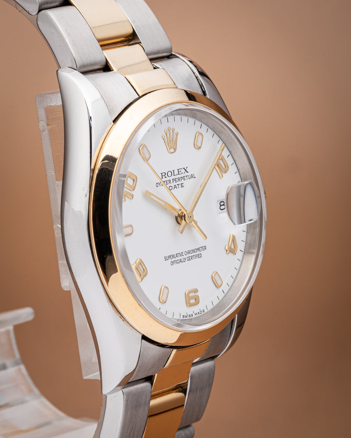 Rolex Stainless Steel and 18k Yellow Gold Date (15203)
