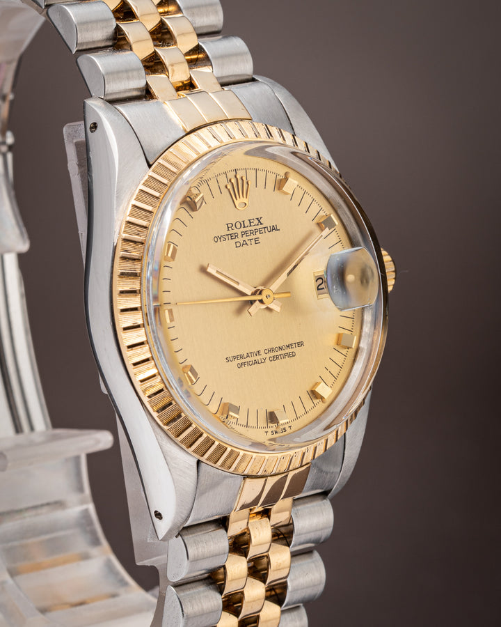 Rolex Stainless Steel and Yellow Gold Date (15053)
